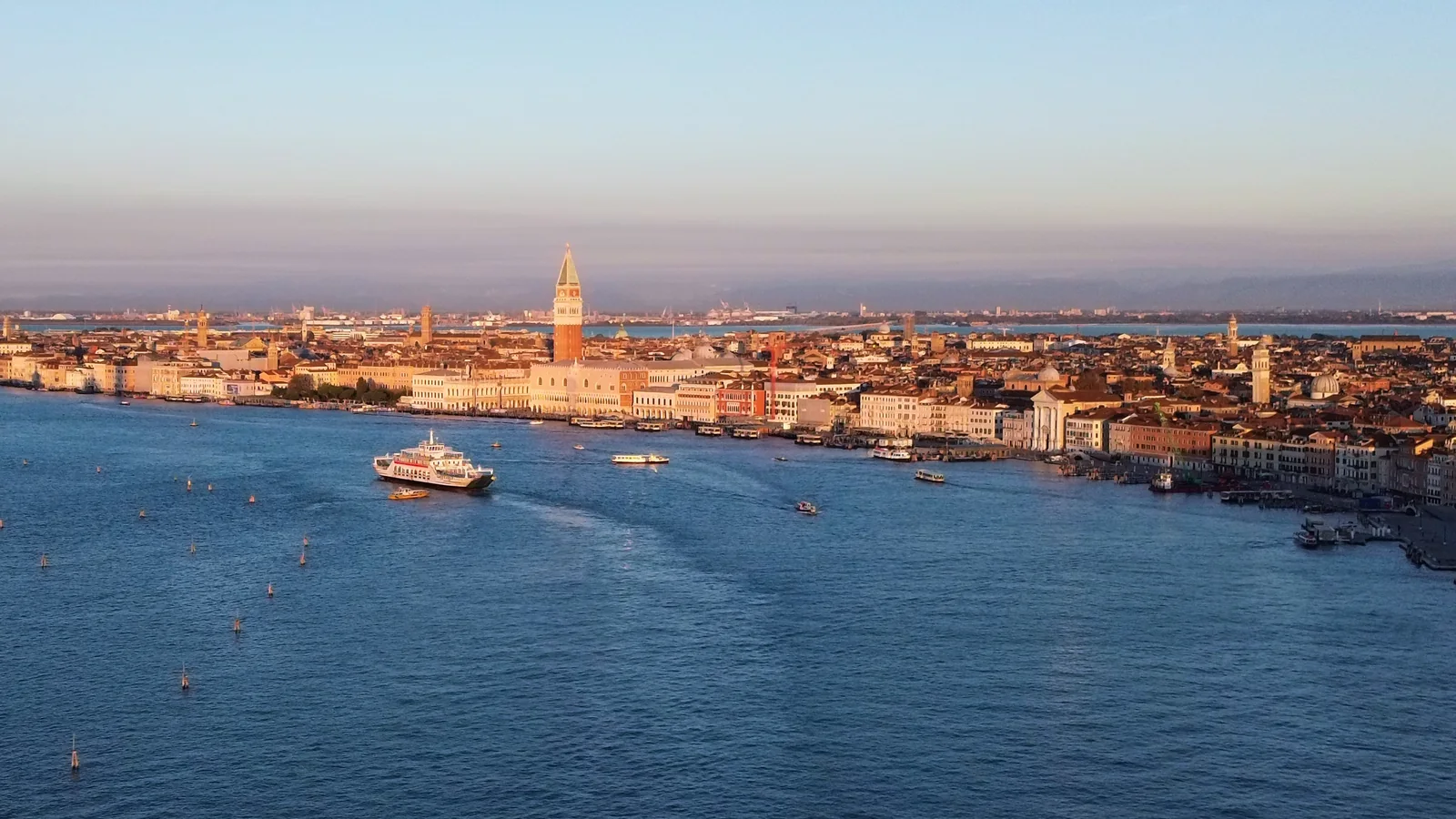 Aerial view of the Venice skyline with the Campanile and Doge's Palace along the basin
